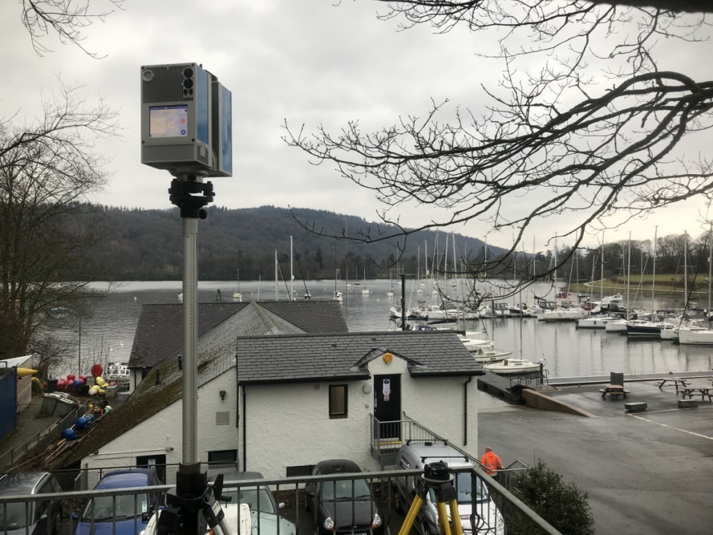 Elevated 3D scanner on balcony overlooking boat moorings onn lake Windermere