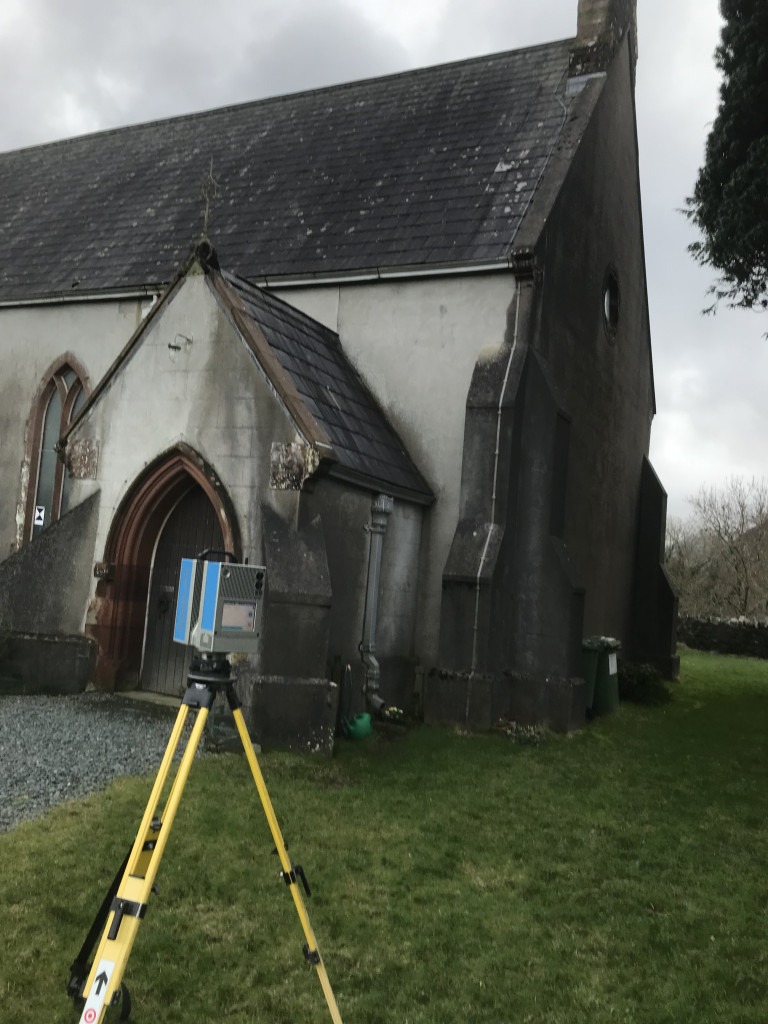 Blue 3D laser scanner on a yellow tripod measuring a rendered church outside the porch.
