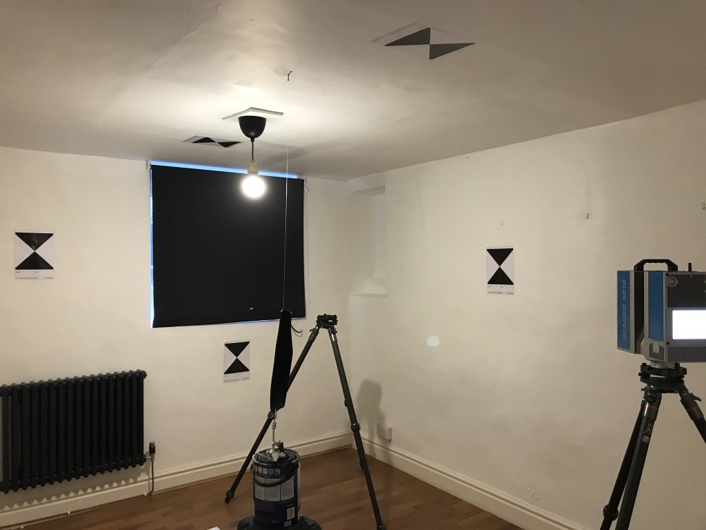 3D scanning a car part suspended on fishing line from the ceiling