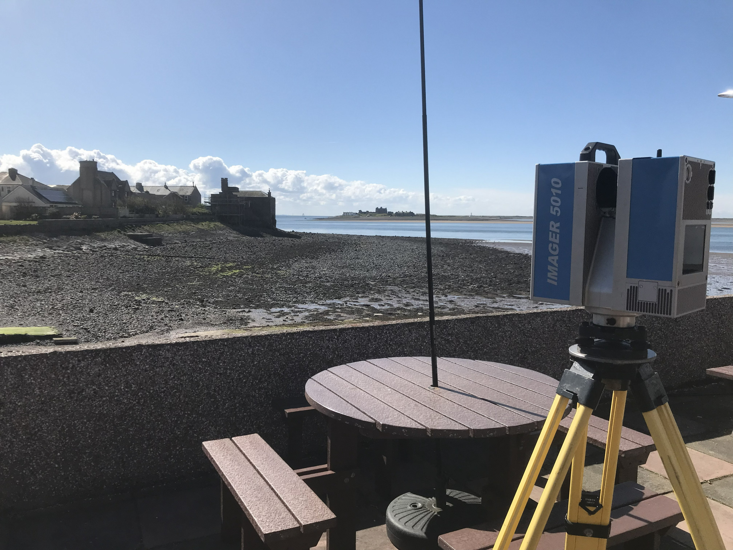 3D laser scanner outside the café with Piel Castle in the distance